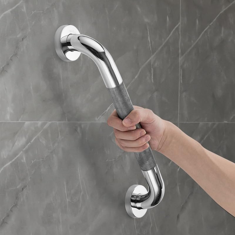 Patient holding stainless steel shower grab bar for support